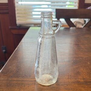 Vintage syrup bottle it does show wear